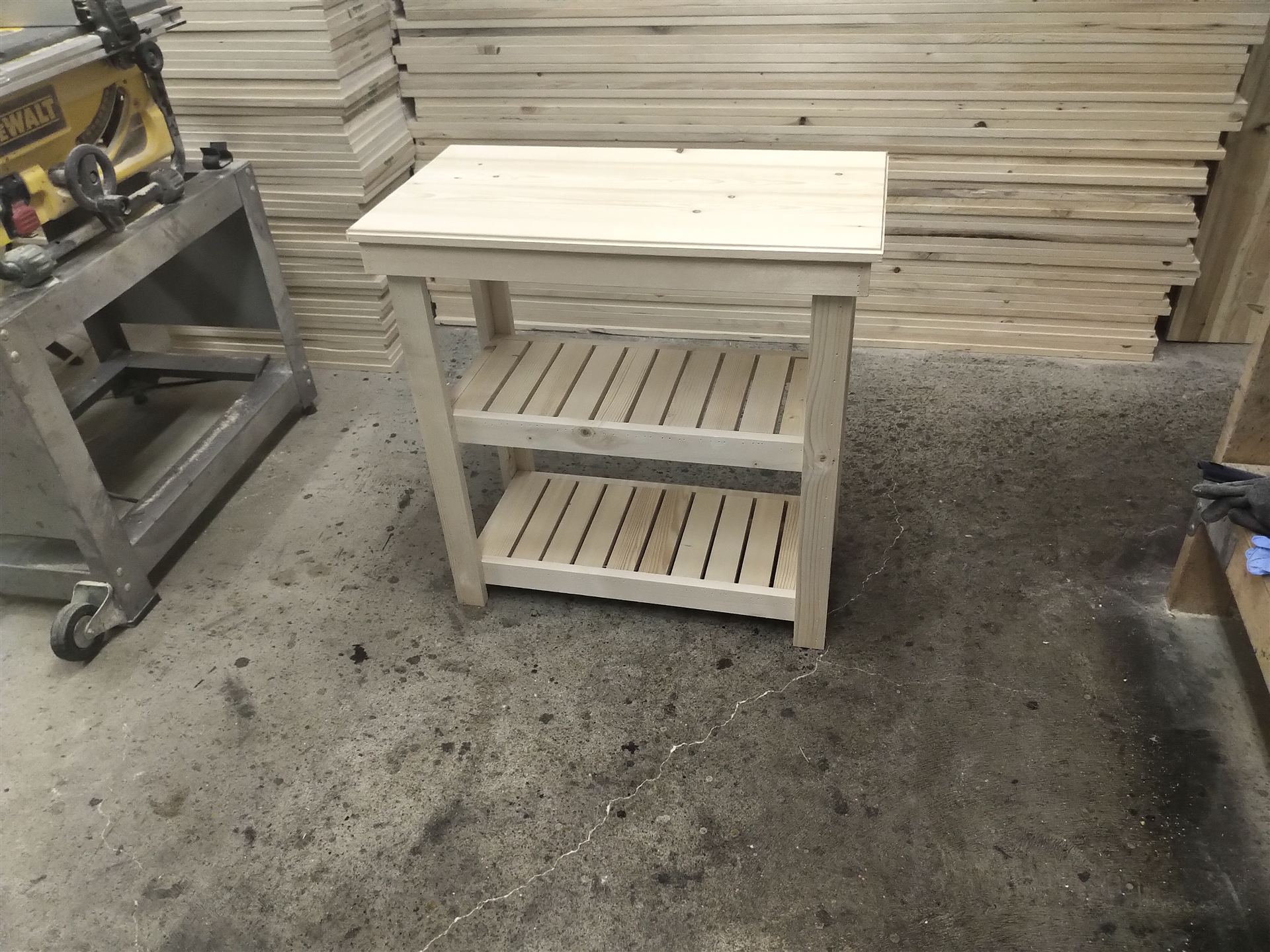Pine console table with slim flat top and slatted shelves