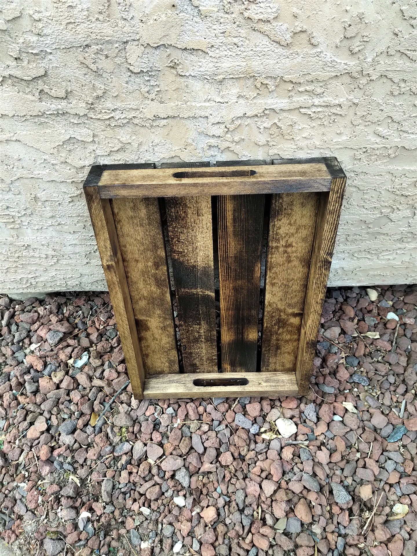 Walnut-stained pine slat crate with cutout handles