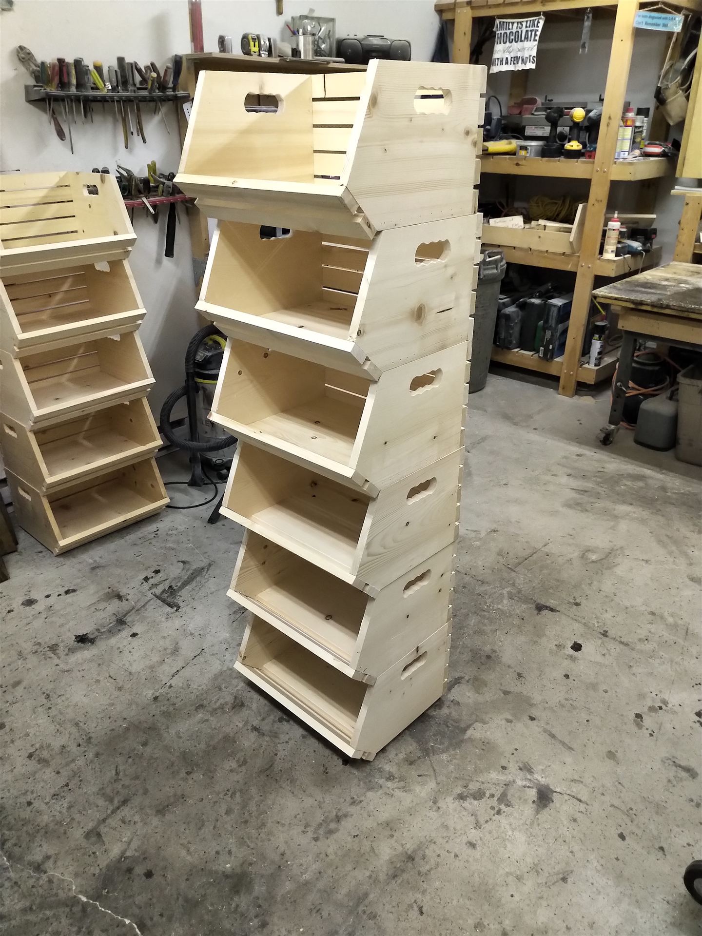 Stained pine retail display shelving stocked with dressings and snacks